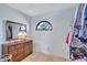 Bright walk-in closet showcasing custom shelving, a window, and plenty of space for storage at 104 Inlets Blvd # 104, Nokomis, FL 34275