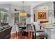 Bright dining area with stylish furnishings and views of the outdoor space at 13811 Nighthawk Ter, Lakewood Ranch, FL 34202