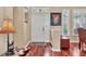 Elegant entryway with hardwood floors, decorative accents, and a bright, welcoming atmosphere at 13811 Nighthawk Ter, Lakewood Ranch, FL 34202