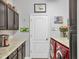 Organized laundry room with modern appliances, ample counter space, and decorative elements at 13811 Nighthawk Ter, Lakewood Ranch, FL 34202