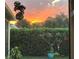 Beautiful backyard at sunset with lush greenery at 15207 17Th E Ave, Bradenton, FL 34212