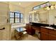 Luxurious bathroom features a soaking tub, dual sinks, and elegant fixtures at 15207 17Th E Ave, Bradenton, FL 34212