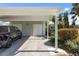 Convenient carport and storage area, providing ample parking and organized storage solutions at 276 Cerromar Way # 60, Venice, FL 34293