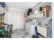 The laundry room has new washer and dryer, ample cabinet storage and utility sink at 276 Cerromar Way # 60, Venice, FL 34293