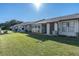 Exterior view of homes with lawn space and patios at 3403 36Th W St # 109, Bradenton, FL 34205