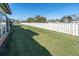 Spacious, well-manicured backyard featuring a privacy fence and green grass at 3403 36Th W St # 109, Bradenton, FL 34205