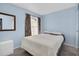 Bright bedroom features carpet, a window with curtains, and closet at 3403 36Th W St # 109, Bradenton, FL 34205