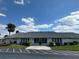 Inviting clubhouse exterior with well-maintained landscaping and easy access parking at 3403 36Th W St # 109, Bradenton, FL 34205