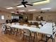 Spacious community room with tables, chairs, and entertainment space, perfect for social gatherings at 3403 36Th W St # 109, Bradenton, FL 34205