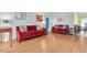 Spacious living room showcasing new wood floors and comfortable seating at 3403 36Th W St # 109, Bradenton, FL 34205