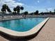 Sparkling community pool with ample seating, perfect for relaxation and recreation under the Florida sun at 3403 36Th W St # 109, Bradenton, FL 34205