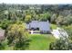 Aerial view of the home showcasing large lot, mature trees, and plenty of privacy at 3651 Walden Pond Dr, Sarasota, FL 34240