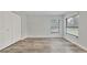 Bright bedroom with natural light, wood-look floors and closet at 3651 Walden Pond Dr, Sarasota, FL 34240