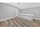Loft area featuring hardwood floors, recessed lighting and white railing surrounding the stairway entrance at 3651 Walden Pond Dr, Sarasota, FL 34240