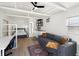 Modern cottage interior with bed, couch, kitchenette, and desk at 3951 Palau Dr, Sarasota, FL 34241