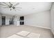 Spacious bonus room features recessed lighting, fan, and a modern wet bar at 4744 Benito Ct, Lakewood Ranch, FL 34211