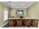 Community bar featuring barstool seating and countertop space at 5684 Duval St, Bradenton, FL 34203