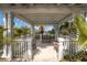 Inviting gazebo with benches offering serene views of the surrounding water at 5684 Duval St, Bradenton, FL 34203