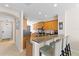 Bright and airy kitchen with a breakfast bar and bar stool seating, perfect for casual dining at 5684 Duval St, Bradenton, FL 34203