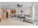 Open floor plan with spacious living room, breakfast bar, and access to the kitchen at 5684 Duval St, Bradenton, FL 34203