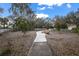 Neighborhood park and recreation area with benches, landscaping, and walkways in a quiet community at 5684 Duval St, Bradenton, FL 34203