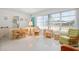 Open living space filled with natural light, showcasing unique furnishings and a relaxed, airy atmosphere at 5724 25Th W St, Bradenton, FL 34207