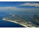 Aerial view of the beach front community with inter coastal waterway views at 5780 Midnight Pass Rd # 303B, Sarasota, FL 34242