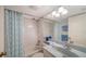 Bathroom featuring a shower-tub combination, mirror, sink and vanity at 5780 Midnight Pass Rd # 303B, Sarasota, FL 34242