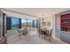 Dining area featuring dual dining areas, balcony access, and fantastic views of the surrounding area at 5780 Midnight Pass Rd # 303B, Sarasota, FL 34242