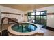Relaxing hot tub room with large windows allowing for plenty of natural light and a peaceful view at 5780 Midnight Pass Rd # 303B, Sarasota, FL 34242