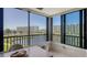 Enclosed lanai featuring views of the inter coastal waterway at 5780 Midnight Pass Rd # 303B, Sarasota, FL 34242