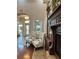 Inviting lobby with a fireplace, decorative windows, and comfortable seating at 6713 Stone River Rd # 206, Bradenton, FL 34203