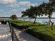 Home with beautifully landscaped backyard and water views at 741 Hideaway Bay Dr, Longboat Key, FL 34228