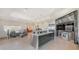Gourmet kitchen boasting custom cabinetry, a large center island, and open layout at 741 Hideaway Bay Dr, Longboat Key, FL 34228