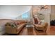 Spacious living room features comfortable leather seating, fireplace, and elegant decor at 741 Hideaway Bay Dr, Longboat Key, FL 34228