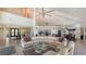 Open concept living room showcasing a large sectional sofa, high ceilings, and modern finishes at 741 Hideaway Bay Dr, Longboat Key, FL 34228