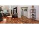Open-concept living room with hardwood floors, modern furniture, and high ceilings for a spacious feel at 741 Hideaway Bay Dr, Longboat Key, FL 34228