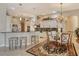 Bright kitchen with sleek countertops, modern appliances, and an adjacent dining area for Gathering meals and gatherings at 1007 3Rd E St, Palmetto, FL 34221