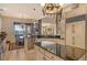 Spacious kitchen with an island, stainless steel appliances, and adjacent dining area at 1007 3Rd E St, Palmetto, FL 34221