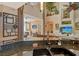 Open concept kitchen with granite countertops, stainless sink, and connection to the living room at 1007 3Rd E St, Palmetto, FL 34221