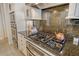 Close-up of the kitchen features granite counters and stainless steel appliances at 1007 3Rd E St, Palmetto, FL 34221