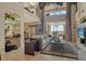 Open-concept living room with soaring ceilings, abundant natural light, and views of the dining area at 1007 3Rd E St, Palmetto, FL 34221