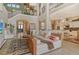Spacious living room with staircase, offering an open floor plan and lots of natural light at 1007 3Rd E St, Palmetto, FL 34221