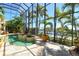 Relaxing enclosed pool with beautiful intercoastal waterway views and lush greenery surrounding at 1007 3Rd E St, Palmetto, FL 34221