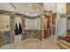 A spacious walk-in shower with glass enclosure and beautiful tiling, connected to the bathroom at 1007 3Rd E St, Palmetto, FL 34221