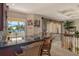 View of the wet bar area, located on the second floor of the home, featuring a granite counter at 1007 3Rd E St, Palmetto, FL 34221
