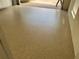 Spacious garage with epoxy flooring for a clean and durable finish at 11629 Garessio Ln, Sarasota, FL 34238