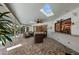 Spacious patio featuring a skylight, comfortable seating, and seamless indoor-outdoor living with pool access at 1612 Pine Harrier Cir, Sarasota, FL 34231