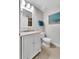 Bathroom featuring a vanity with a sink, toilet, and tile flooring at 2001 Bal Harbor Blvd # 2301, Punta Gorda, FL 33950