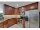 Kitchen featuring stainless steel appliances, stone counters and plenty of cabinet space at 2001 Bal Harbor Blvd # 2301, Punta Gorda, FL 33950